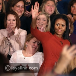 Michelle Obama تودع البيت الأبيض بفستان أحمر 