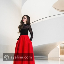 تنورة تل حمراء مع البلوزة السوداء