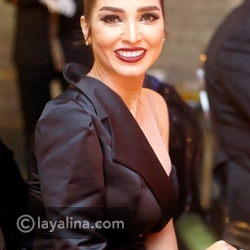 صور روجينا تقلب الموازين بفستان غريب التصميم هل أخفقت في اختيارها مجلة قمر بغداد