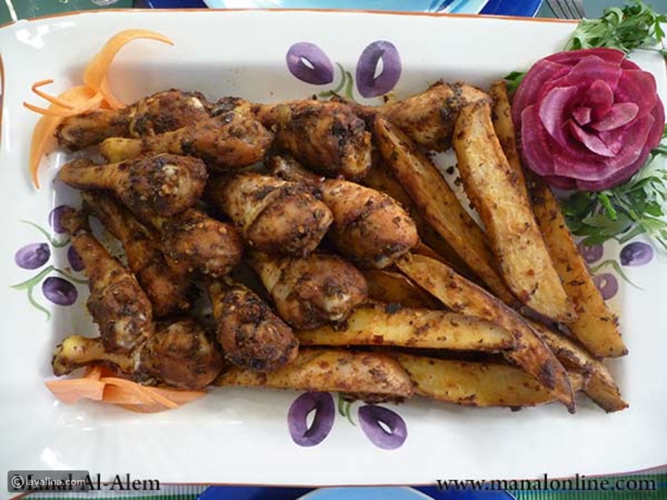 أفخاذ الدجاج المشوية مع البطاطس من مطبخ منال العالم
